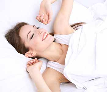 Image of a young lady sleeping with comfortabily